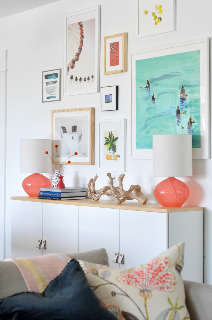 Love this colorful gallery wall in the dining room 