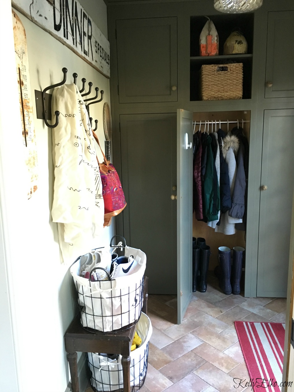 Love this organized mudroom with built in closets kellyelko.com