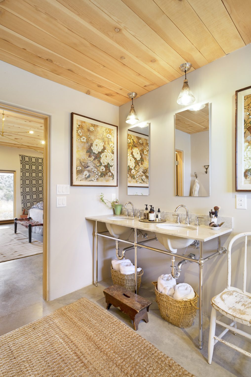 Chrome and marble double vanity in this beautiful master bathroom