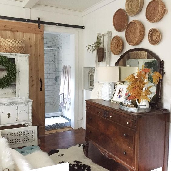 Eclectic Home Tour of Union Willow - love the rolling barn door and the basket gallery wall kellyelko.com