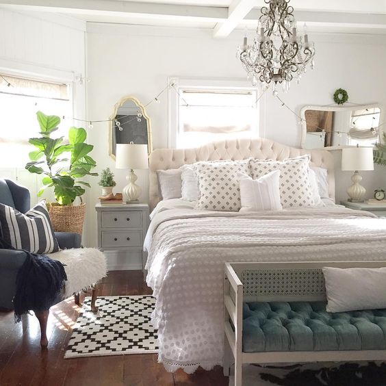 Farmhouse neutral bedroom with crystal chandelier kellyelko.com