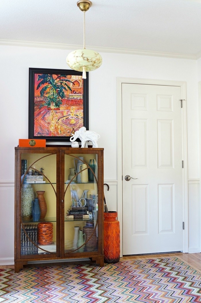 Vintage cabinet with modern art 