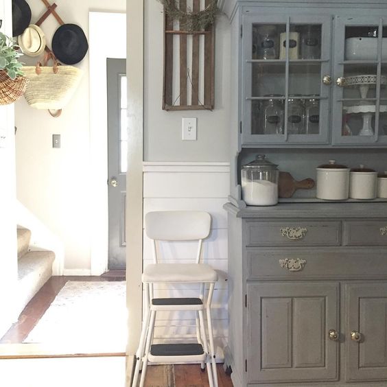 Farmhouse with painted cupboard and vintage step stool kellyelko.com