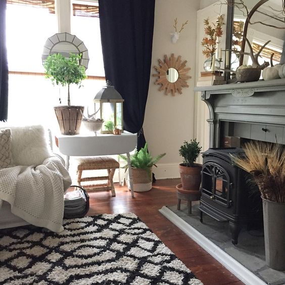 Farmhouse home tour - love the original old mantel painted a deep shade of gray kellyelko.com