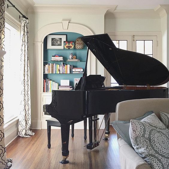 Grand piano in the corner of this gorgeous living room kellyelko.com