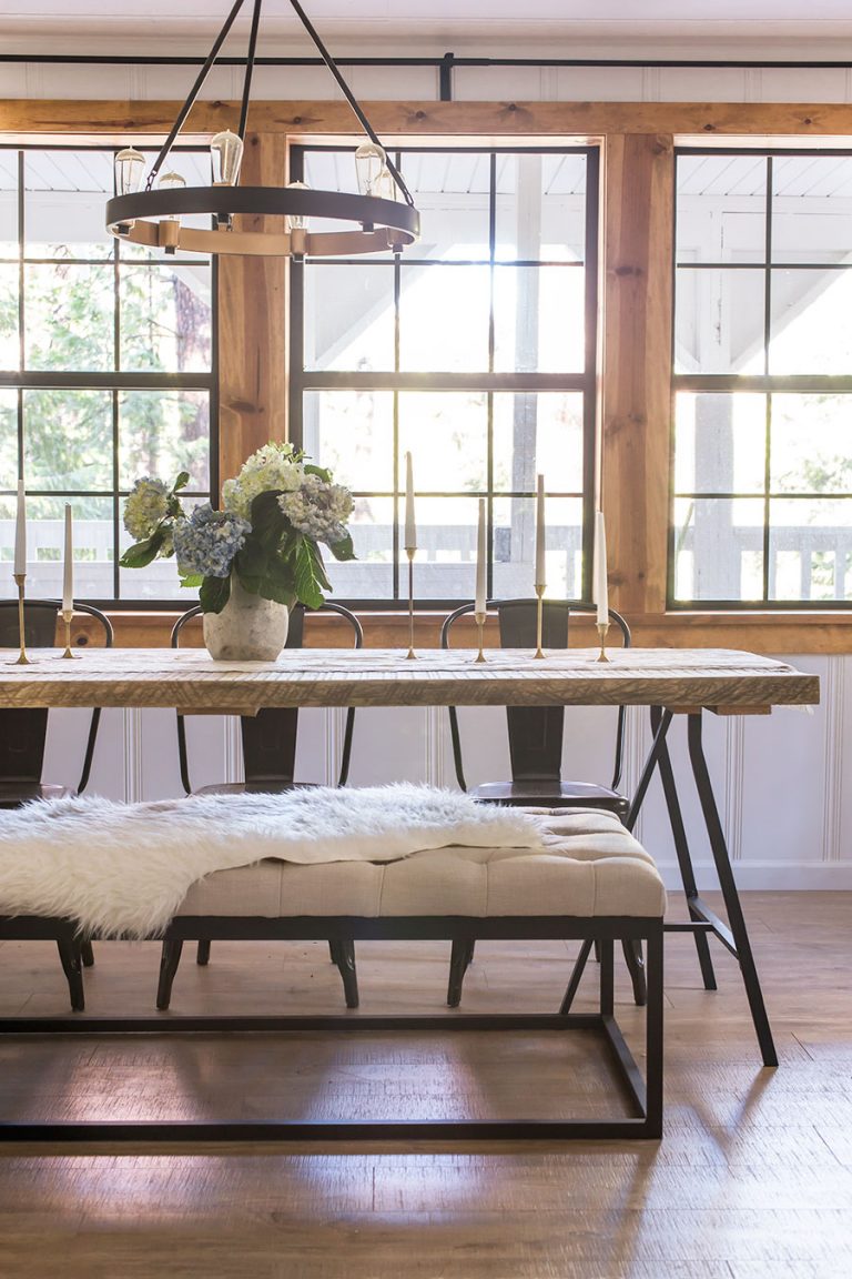 Gorgeous wood and metal dining table with metal chairs and bench