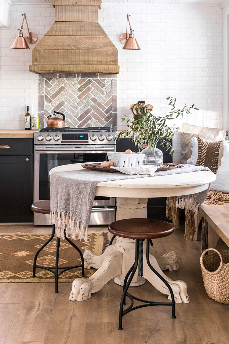 Cottage kitchen with subway tile mixed with brick backsplash 