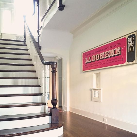 Antique opera sign makes a statement in this grand foyer kellyelko.com