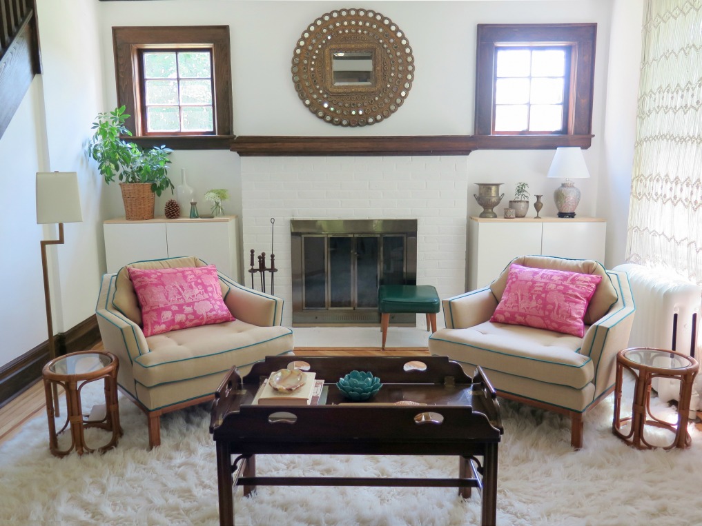 Symmetry - love the matching club chairs in this boho chic living room 