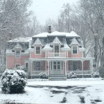 Houses in the snow - love this pink Victorian home kellyelko.com