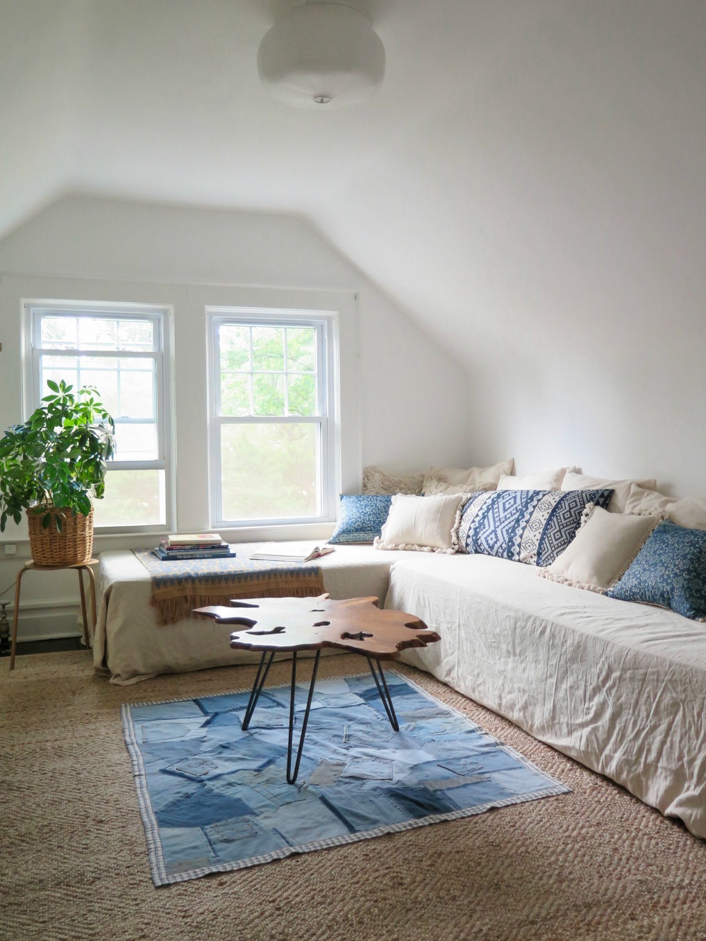 Sectional sofa with blue pillows