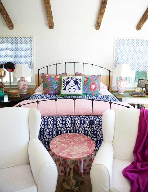 Colorful bedroom with iron bed