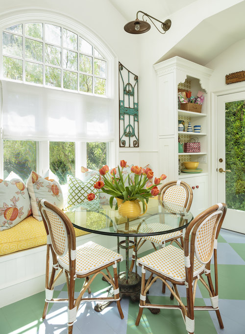 Colorful breakfast nook with built in banquette