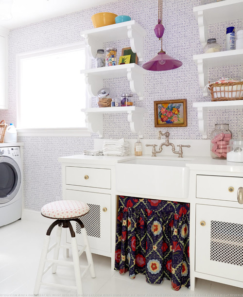 Love this purple and white laundry room with open shelves