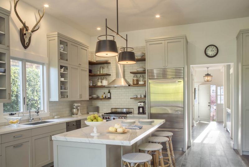 Eclectic Home Tour - Mill Valley House is a stunning renovation that includes this beautiful gray and white kitchen with open shelves and subway tile 