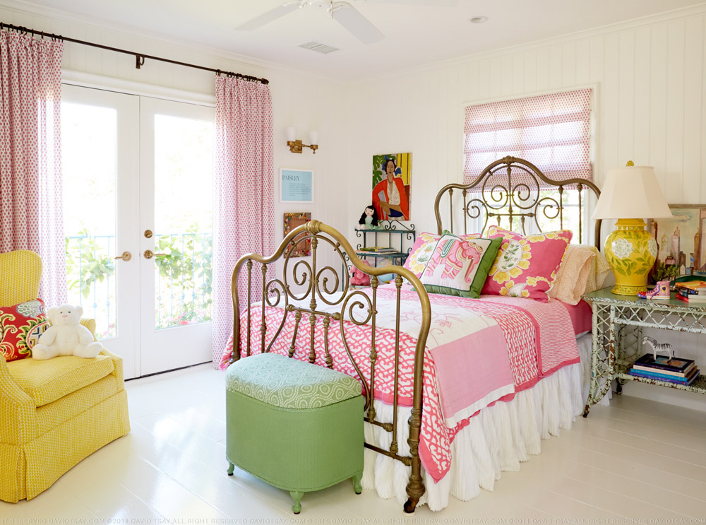 Colorful girls bedroom with vintage brass bed