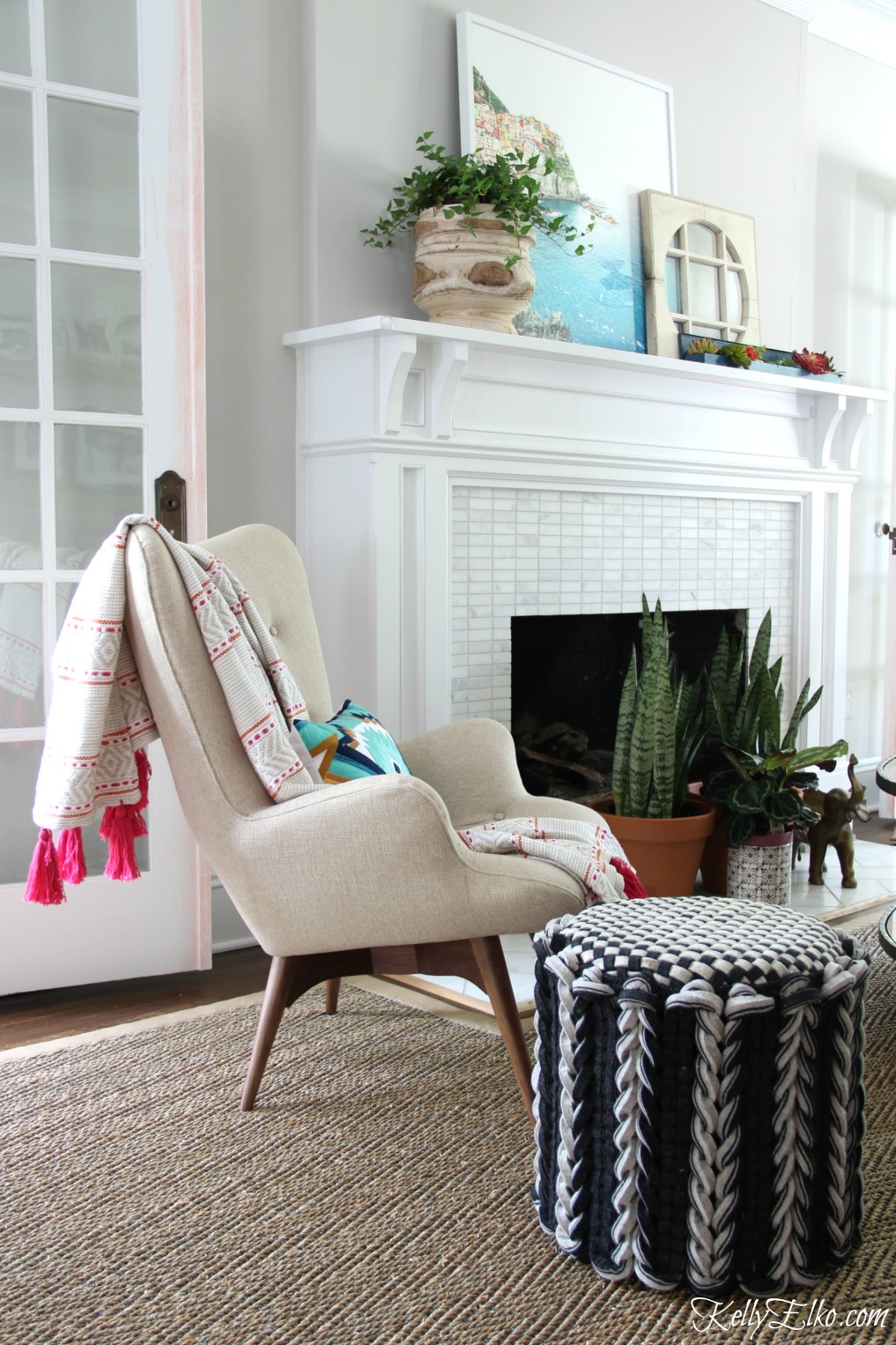 Love this teddy bear chair with tassel throw and braided wool ottoman kellyelko.com