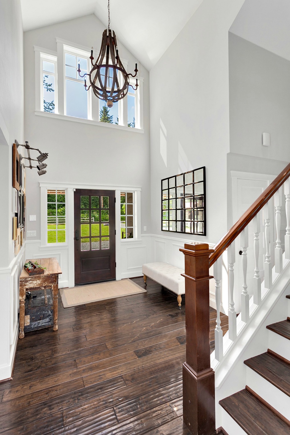 Dramatic two story foyer - love the chandelier kellyelko.com