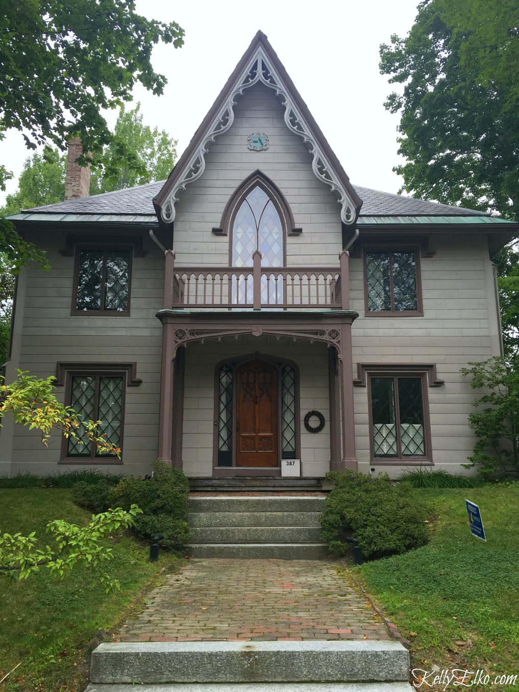 Gothic architecture home with leaded glass windows kellyelko.com