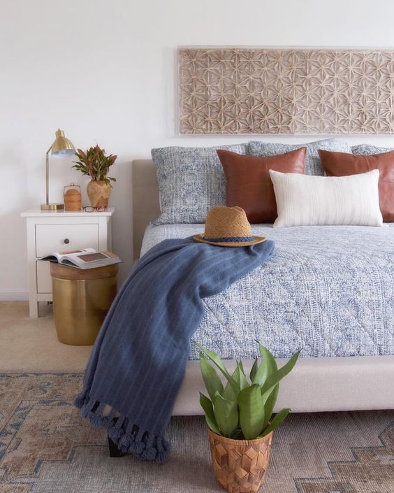 Neutral bedroom with paper cut art and touches of blue kellyelko.com