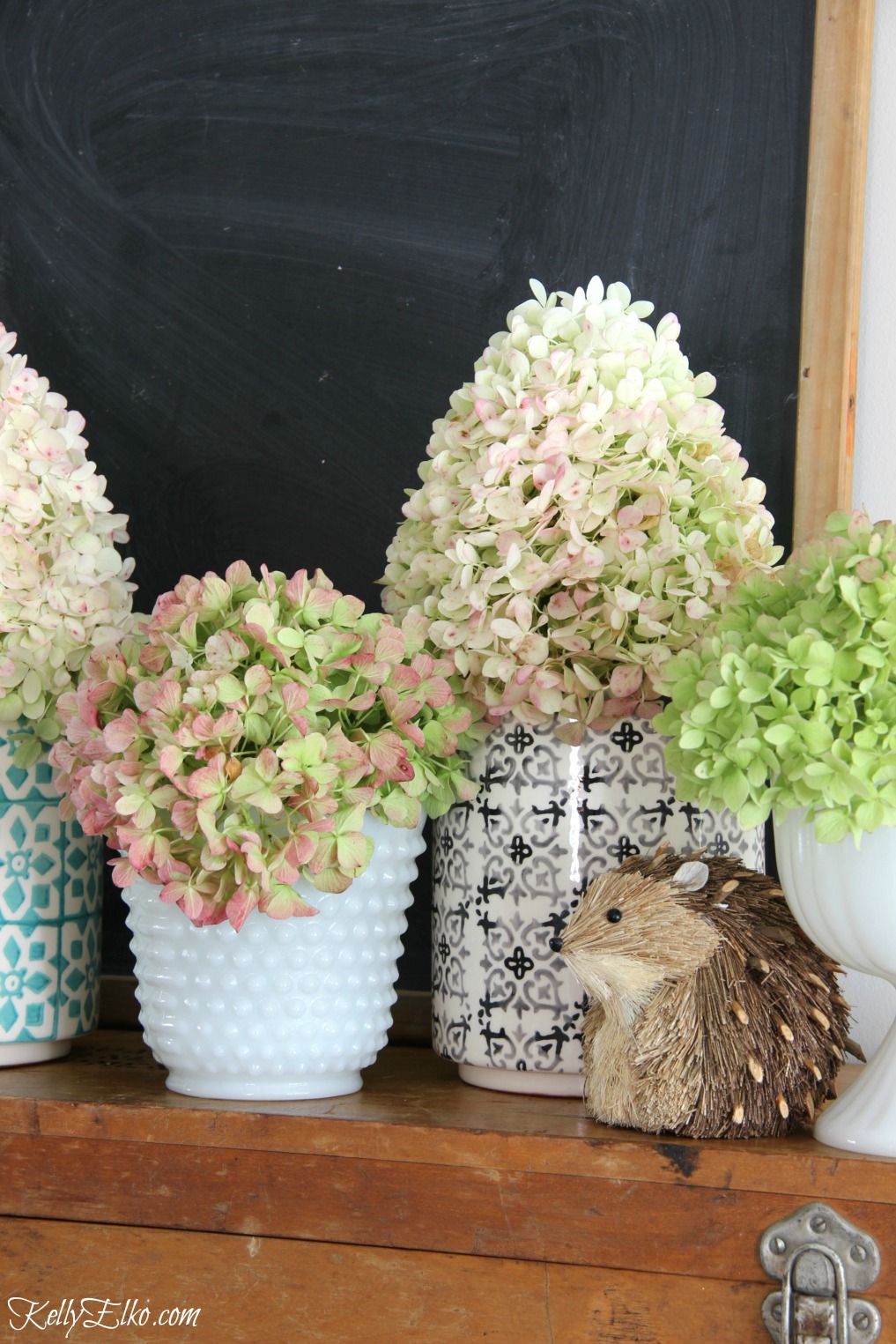 Hydrangeas in a variety of vintage and new vases kellyelko.com