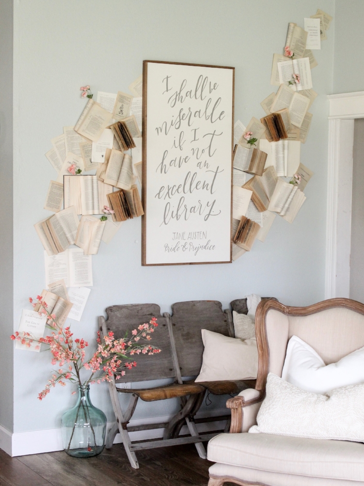 Farmhouse tour - love this wall of books cascading down the wall