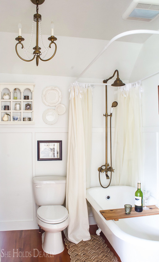 Farmhouse tour - love the antique clawfoot bathtub and brass fixtures