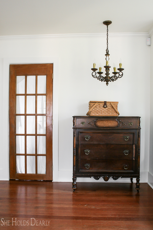 Farmhouse tour - love the white walls with warm wood floors and furniture