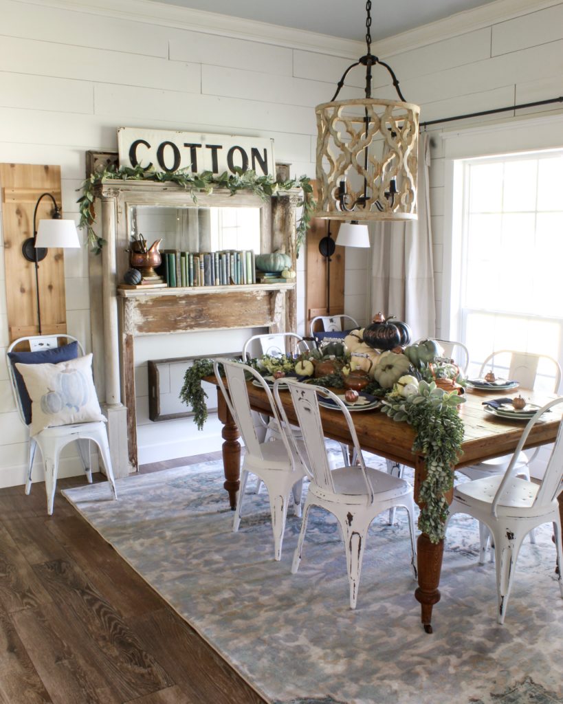 Farmhouse tour - love the shiplap walls and antique table and chippy mantel 