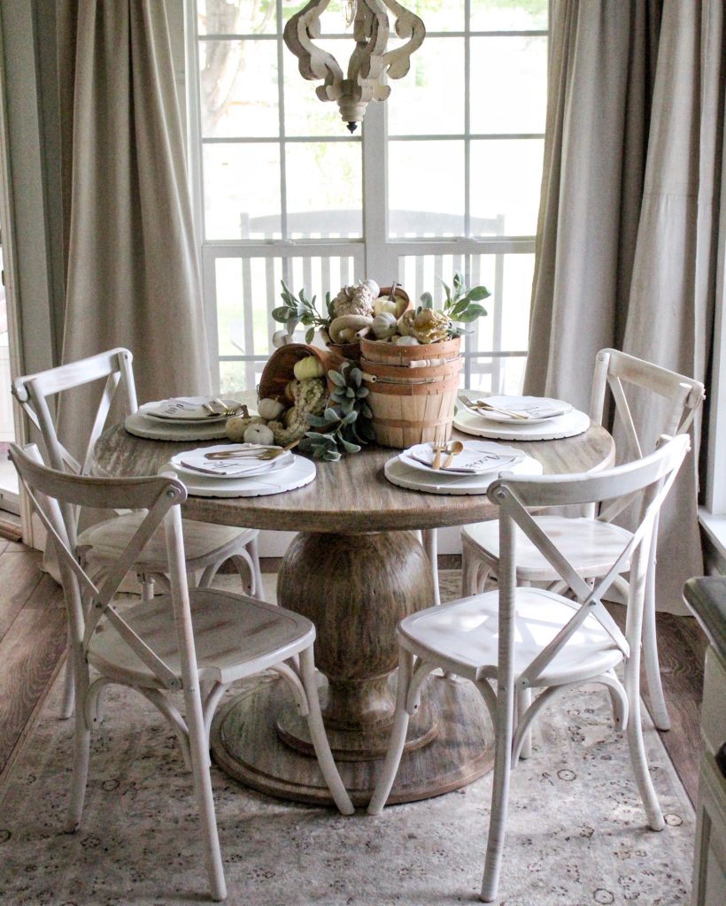 Farmhouse tour - love this round dining table set for fall