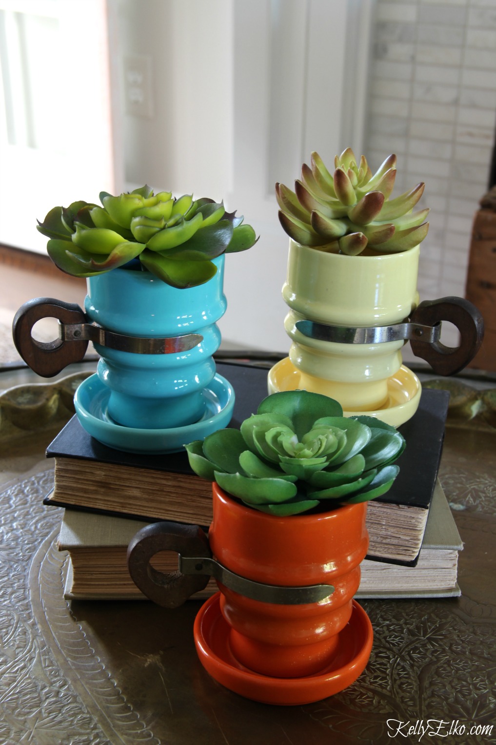 Love this trio of vintage metlox mugs filled with succulents kellyelko.com