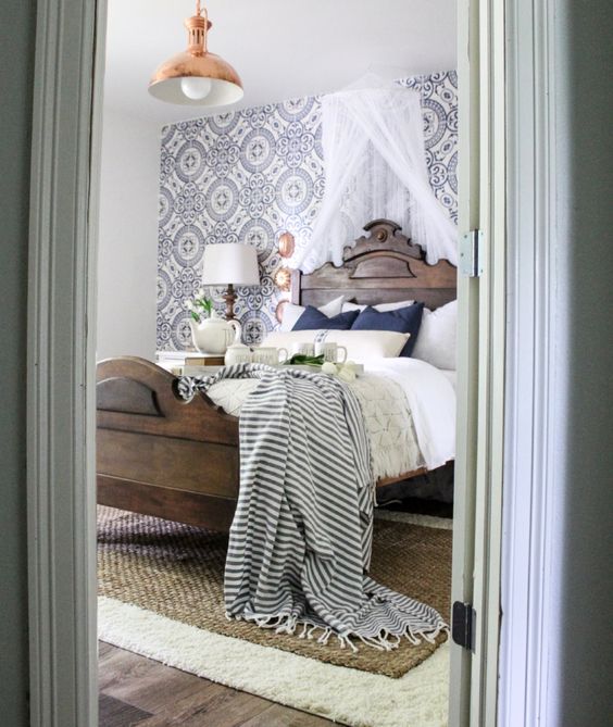 Farmhouse tour - love this vintage modern bedroom with cement tile wallpaper and antique copper light