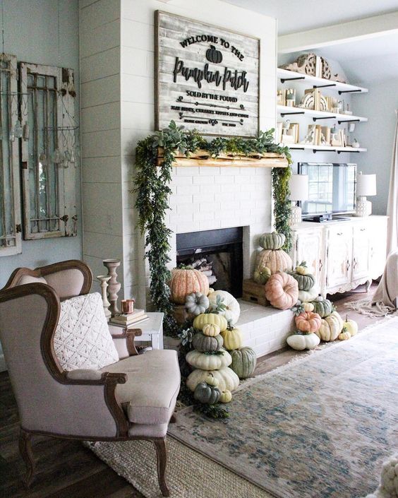 Farmhouse tour - love the pumpkin mantel 