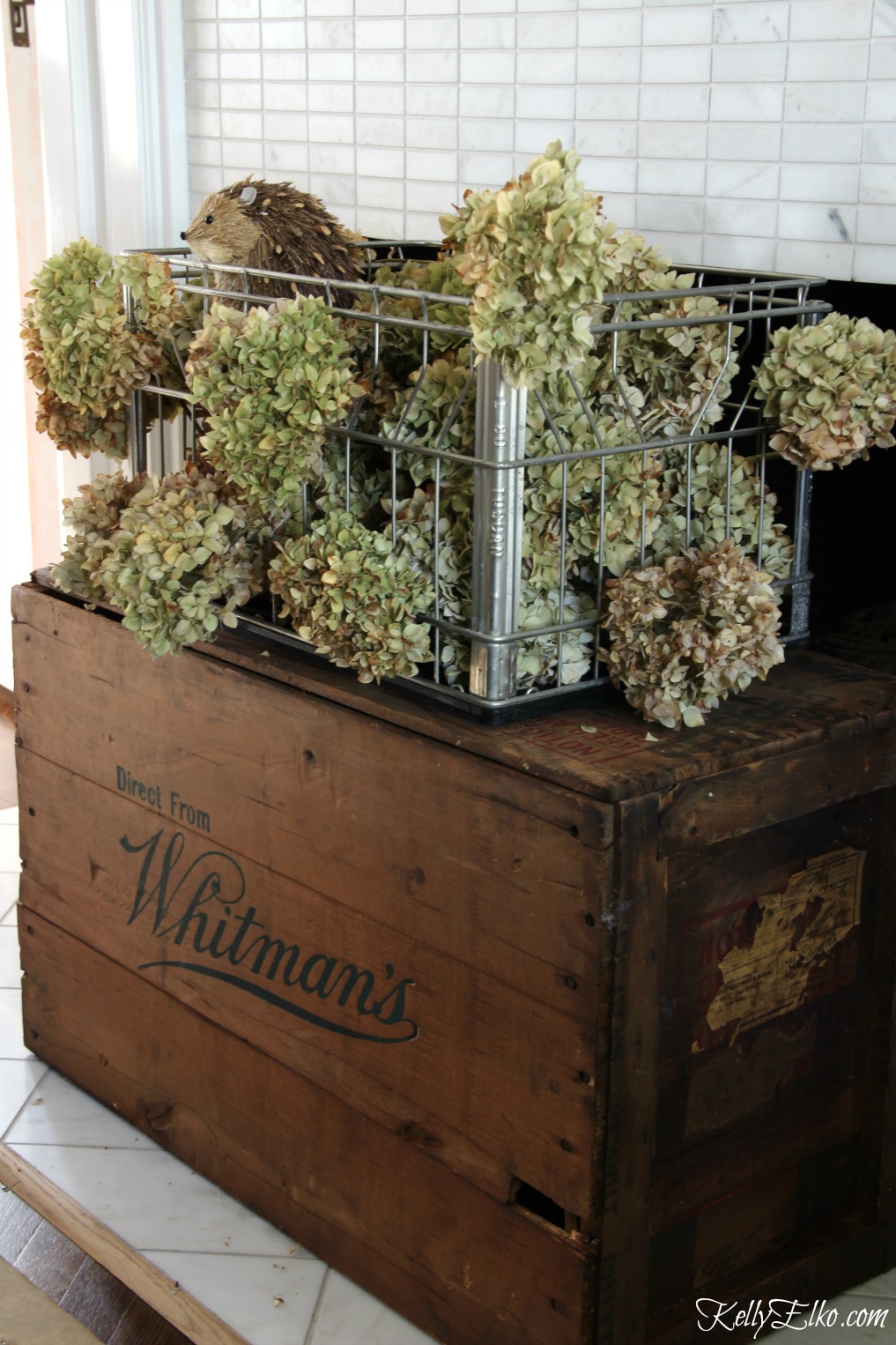 Vintage milk crate filled with dried hydrangeas kellyelko.com