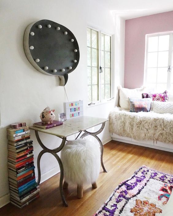 Fun girls bedroom with marquee light over desk