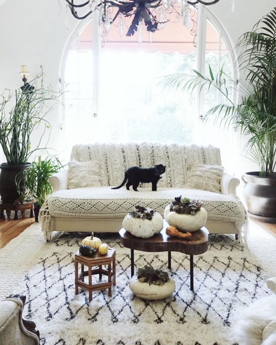 Boho living room with Moroccan wedding blanket and rug