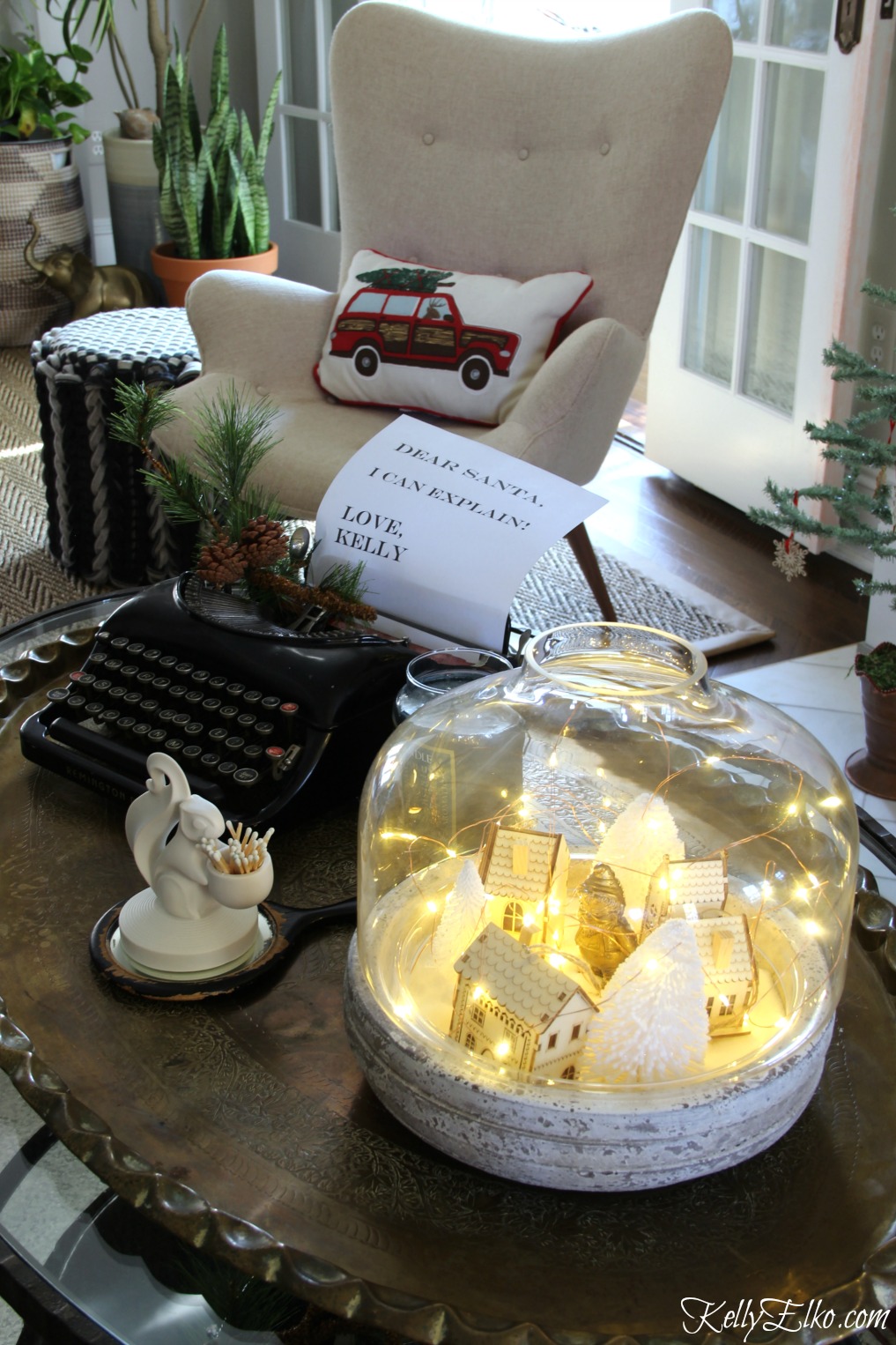 Love the vintage typewriter with a letter from Santa and the winter village jar filled with fairy lights kellyelko.com #christmas #vintagechristmas #christmasdecor #diychristmasdecor #terrarium #christmasdecorating #kellyelko