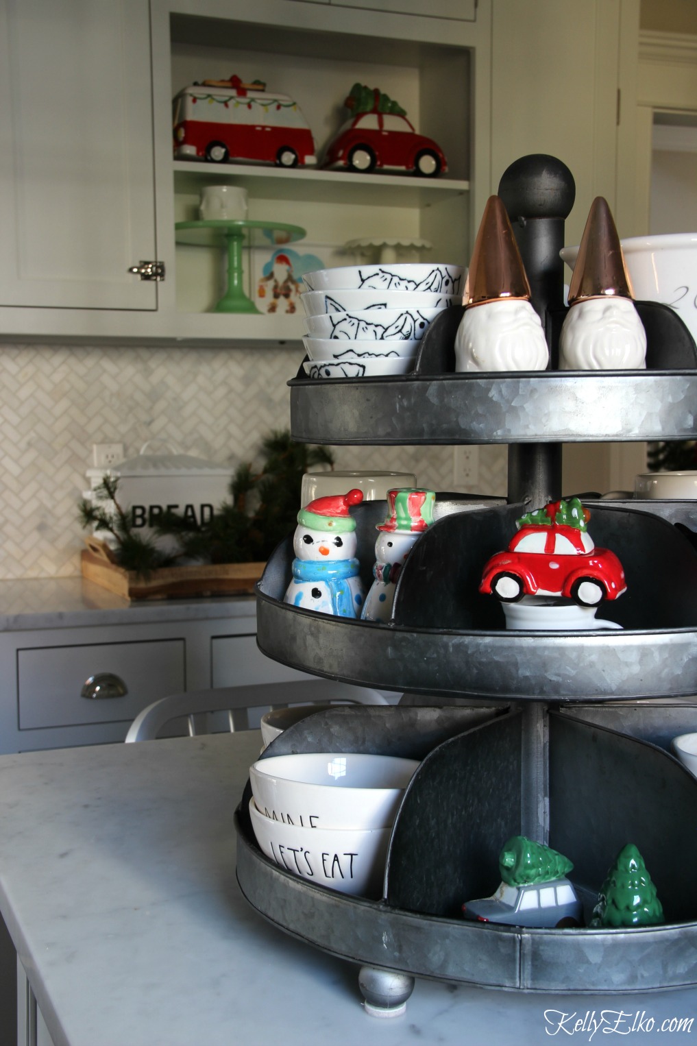 Christmas Kitchen - love this galvanized tiered tray for displaying everyday items and Christmas salt and pepper shakers kellyelko.com