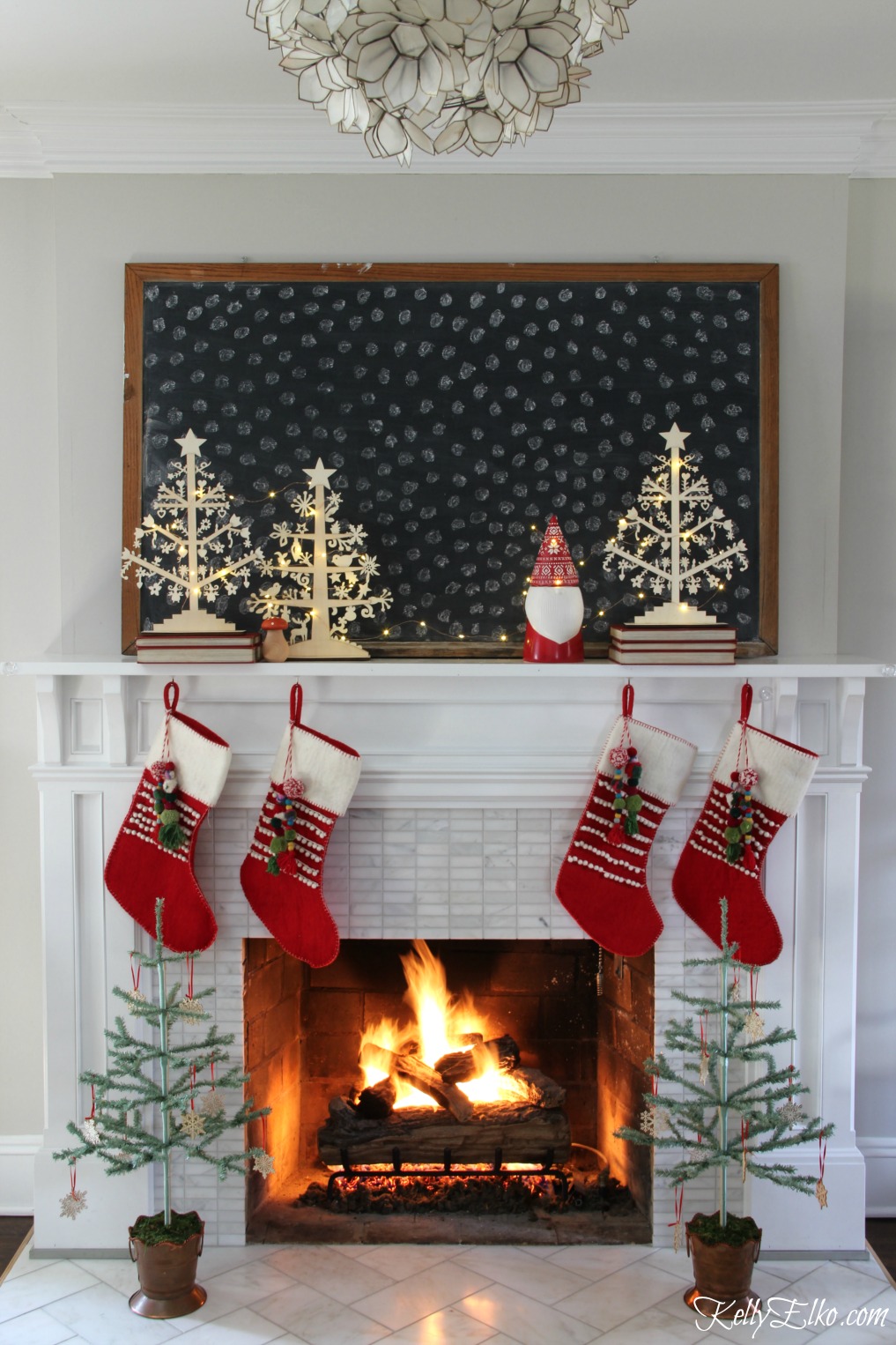 Let's Stay Home for Christmas Home Tour - love this chalkboard mantel kellyelko.com