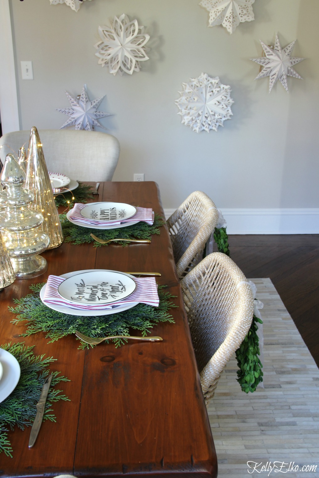 Christmas Home Tour - love the wall of paper snowflakes kellyelko.com