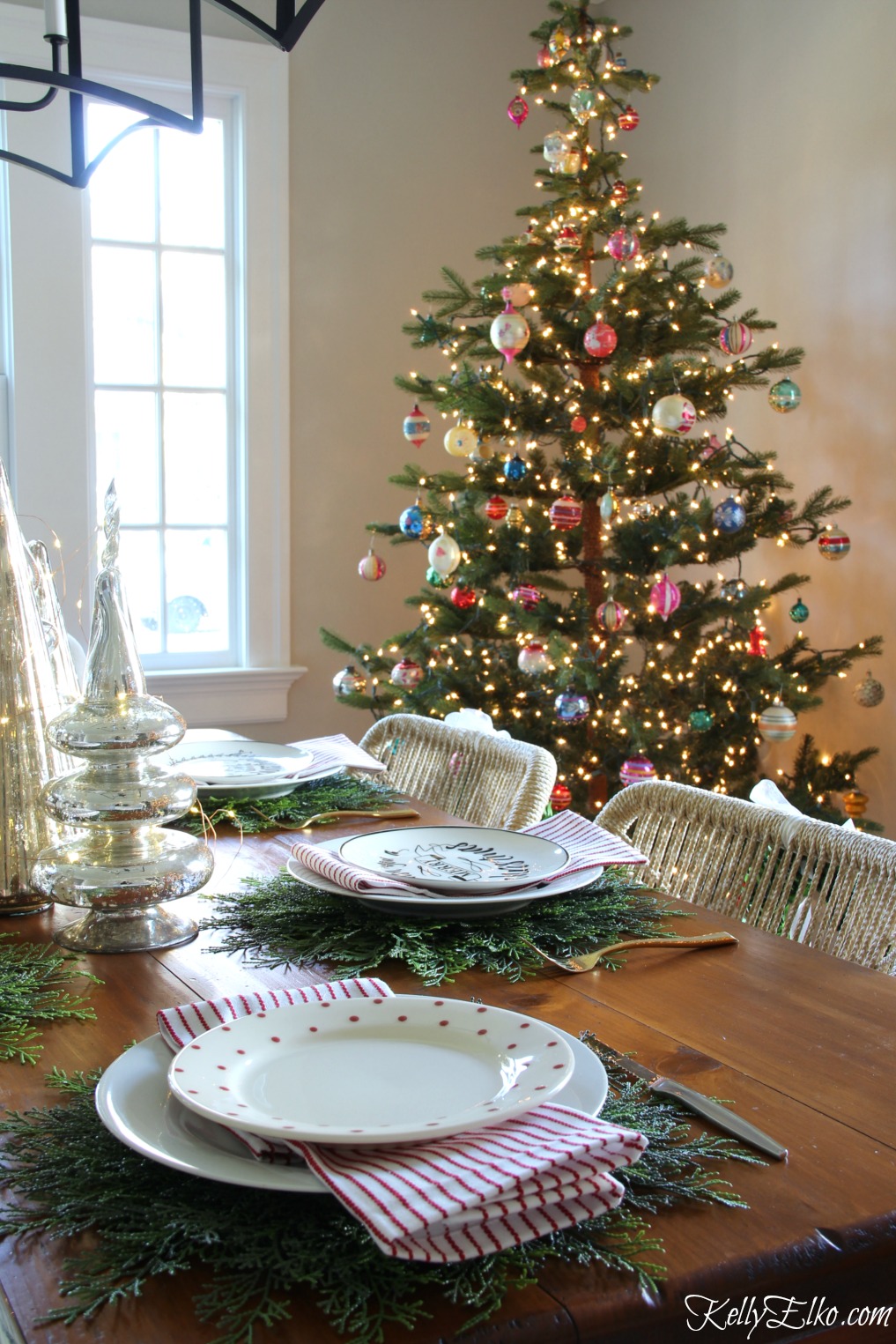 Christmas Home Tour - love this table setting with cedar placemats! kellyelko.com