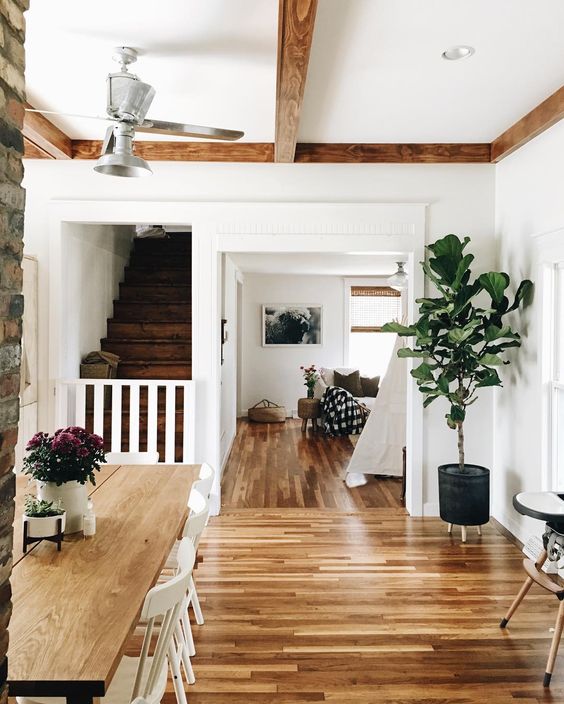 Farmhouse Tour - love the wood floors and beams with white walls