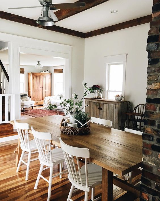 Farmhouse Tour - love the big wood table and white chairs