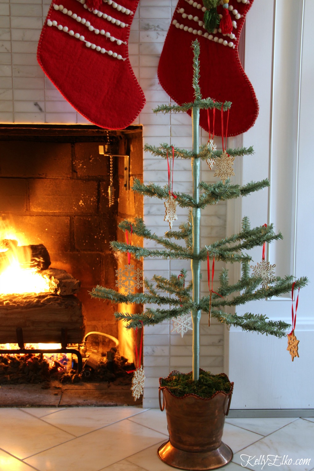 Christmas Home Tour - love this little feather tree kellyelko.com