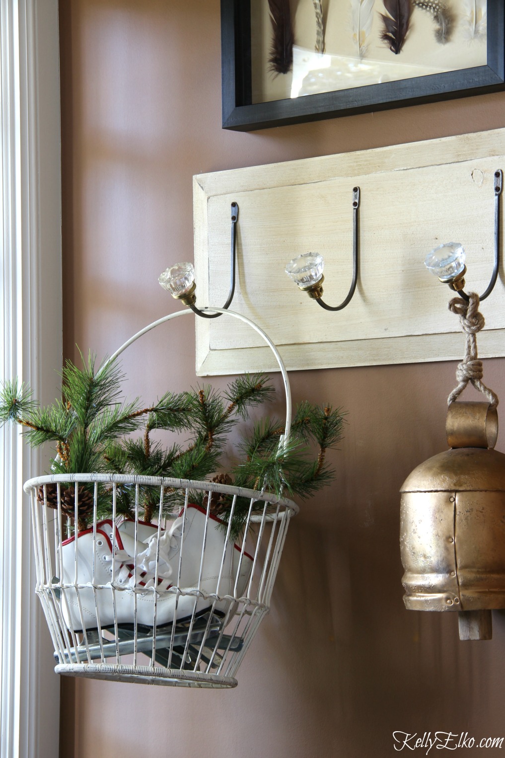 Christmas Home Tour - love this basket filled with ice skates kellyelko.com