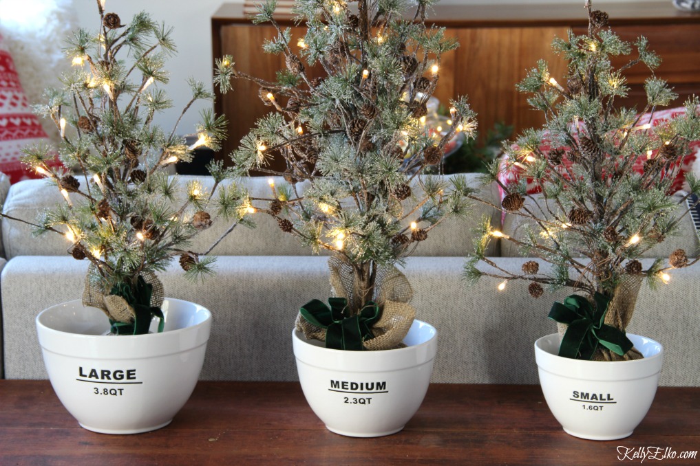 Christmas Kitchen - love this trio of bowls holding mini Christmas trees kellyelko.com