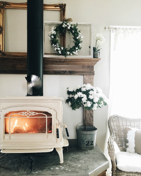 Farmhouse Tour - love this white wood burning stove 