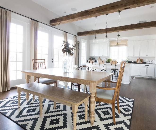 Eclectic Home Tour of Green Spruce Designs - antique beams add warmth and character to this white kitchen