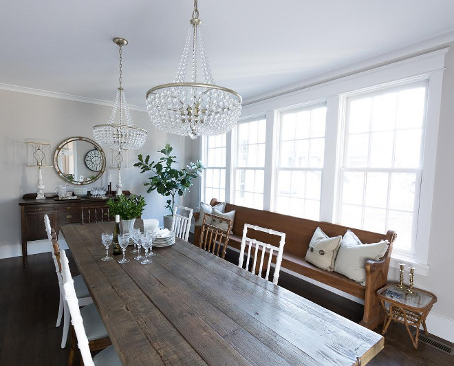 Eclectic Home Tour of Green Spruce Designs - love this dining room with old farm table, mismatched bamboo chairs and old church pew