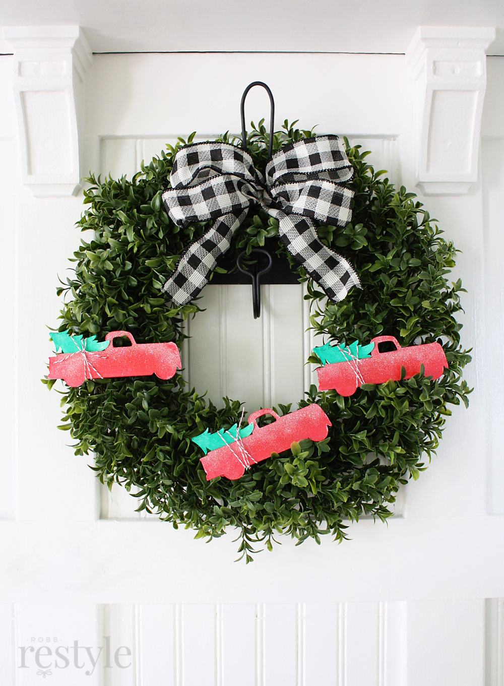 Eclectic Christmas Home Tour - red trucks hauling Christmas trees